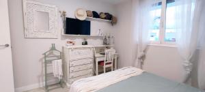Postel nebo postele na pokoji v ubytování Dunas Beach Apartment