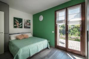 Katil atau katil-katil dalam bilik di ALTIDO Luxury flat & Lake Como view