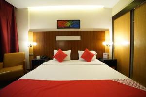 Cama o camas de una habitación en Sun And Sands Downtown