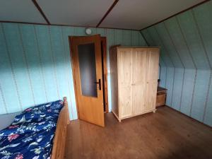 TV a/nebo společenská místnost v ubytování Chata KOZLOV