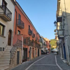 an empty street in a city with buildings at B&B Anastasia in Buccino