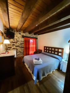 Postel nebo postele na pokoji v ubytování La Hoja de Roble + 30 fotografií