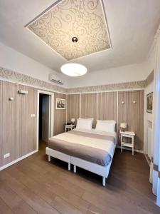 Postel nebo postele na pokoji v ubytování Hotel La Pace