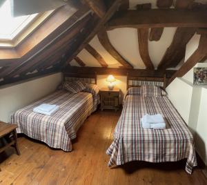 A bed or beds in a room at Abelardo's Home