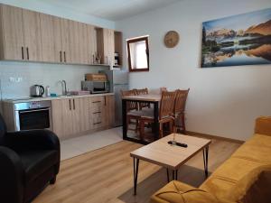 Cucina o angolo cottura di Monte Pino Lux Apartments