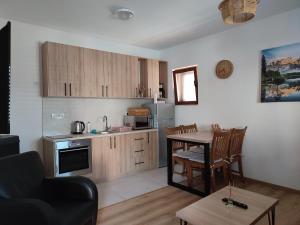 Cucina o angolo cottura di Monte Pino Lux Apartments