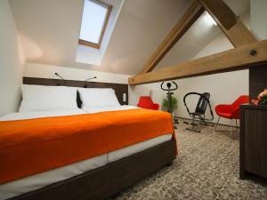 Posteľ alebo postele v izbe v ubytovaní EA Business Hotel Jihlava