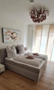 Katil atau katil-katil dalam bilik di Luxuswohnung mit Weserblick nähe City