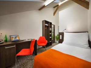 Posteľ alebo postele v izbe v ubytovaní EA Business Hotel Jihlava