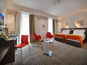 TV a/nebo společenská místnost v ubytování EA Business Hotel Jihlava
