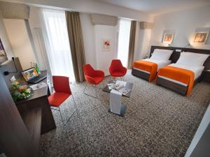 Posteľ alebo postele v izbe v ubytovaní EA Business Hotel Jihlava