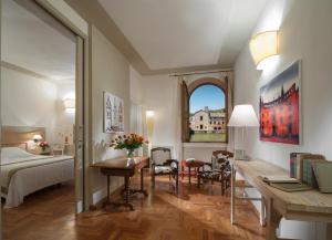 Ένα ή περισσότερα κρεβάτια σε δωμάτιο στο Albergo Le Terme