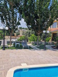 Foto sihtkohas Pendakomo asuva majutusasutuse SUNNY CAPTAINS HOUSE with a pool galeriist