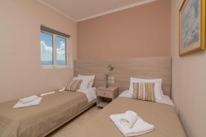 Voodi või voodid majutusasutuse Hotel Varres toas