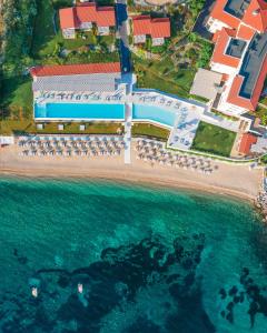an aerial view of a resort on the beach at Mount Athos Resort in Ierissos +151 photos