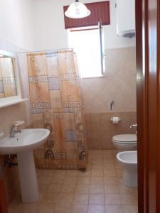 Koupelna v ubytování Villetta Goccia D'oro