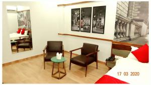 Annandam Inn(Hotel Anand)的休息区