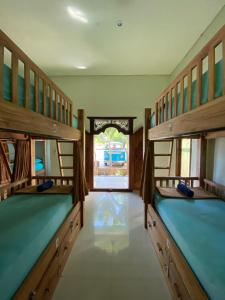 Postel nebo postele na pokoji v ubytování Lembongan Hostel