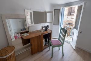 Kuchyňa alebo kuchynka v ubytovaní Rosella - maison de charme au cœur du village