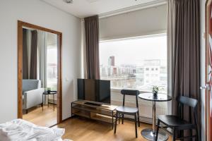 Posezení v ubytování Hiisi Hotel Helsinki Jätkäsaari