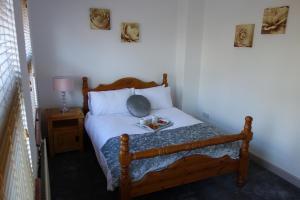 Postel nebo postele na pokoji v ubytování Bluebell Place + 2 fotografie