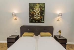 Posteľ alebo postele v izbe v ubytovaní Bengt Apartment Kiraly str.