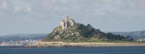 a castle on top of an island in the water at Tregiffian Farm B&B in Penzance