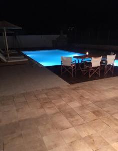 The swimming pool at or close to Villa Evenik