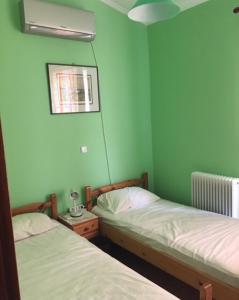 A bed or beds in a room at Villa Evenik