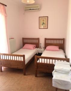 A bed or beds in a room at Villa Evenik