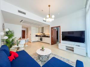 TV a/nebo společenská místnost v ubytování High Floor - Beautiful 1BR Dubai Marina Gate
