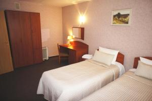 Кровать или кровати в номере Гостиница Булгар