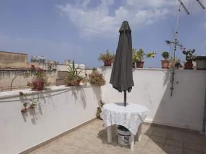 Balcone o terrazza di Casa dello Scoglio nel mare