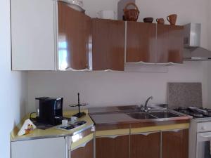 Cucina o angolo cottura di Casa dello Scoglio nel mare
