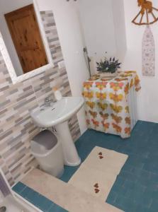 Koupelna v ubytování Casa dello Scoglio nel mare + 37 fotografií