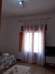 Letto o letti in una camera di Casa dello Scoglio nel mare
