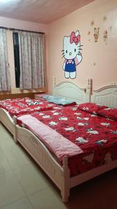 Postel nebo postele na pokoji v ubytování Donggang Town B&B