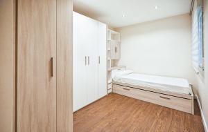 A bed or beds in a room at A Misericordia Viveiro