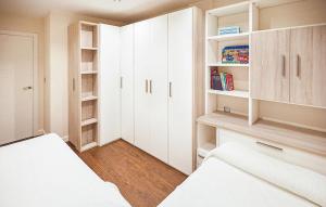 A bed or beds in a room at A Misericordia Viveiro