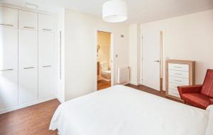 A bed or beds in a room at A Misericordia Viveiro
