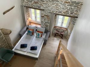Rúm í herbergi á Domaine de Kerdavid - Chambres d'hôtes à Remungol