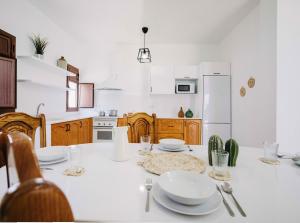 Kuchyň nebo kuchyňský kout v ubytování Apartamentos El Marinero - Casa Juana