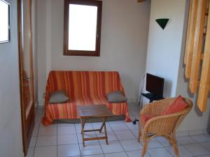 a living room with a couch and a table at Chalet Albiez-Montrond, 4 pièces, 8 personnes - FR-1-618-16 in Albiez-Montrond