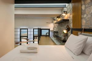 Cama o camas de una habitación en Skins Concept Boutique Apartment