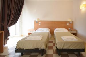 Postel nebo postele na pokoji v ubytování Domus Stella Maris - Casa per Ferie