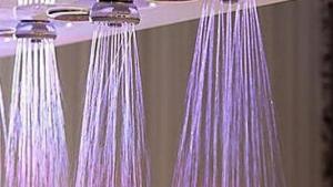 two pink shower curtains hanging from a shower head at B&B Cà d'Artisti in Caorle