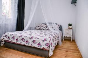 Postel nebo postele na pokoji v ubytování Kućerak Sofija