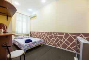 Postel nebo postele na pokoji v ubytování Mini-hotel in the heart of Kiev
