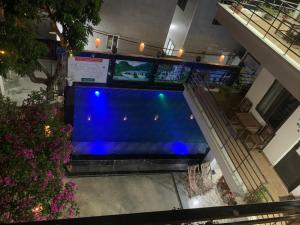 an overhead view of a swimming pool in a building at Tam Coc Victoria Hotel in Ninh Binh
