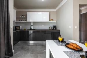 Kuchyň nebo kuchyňský kout v ubytování Apartments MaKris No1
